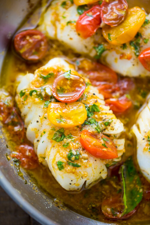 A quick and easy recipe for Pan-Seared Cod in White Wine Tomato Basil Sauce!