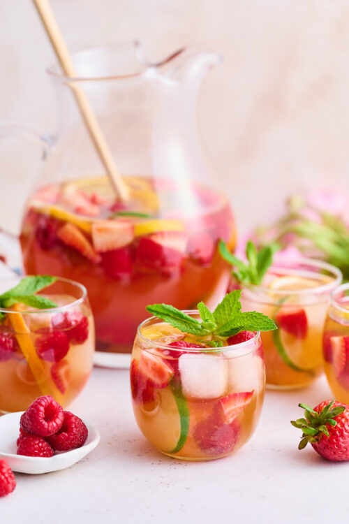 The only thing better than rosé wine is rosé sangria! And this refreshing rosé sangria recipe is made in a large pitcher and chilled in the fridge so it's ready to serve when your guests arrive. Garnish with fresh raspberries, strawberries, and citrus slices for a stunning presentation.